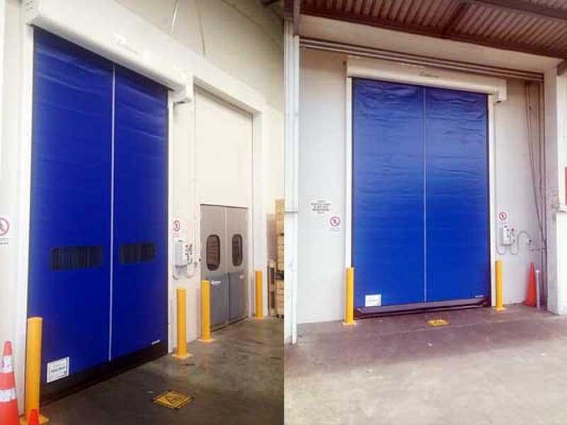 Blue Ultiroll high speed doors installed in a warehouse facility.